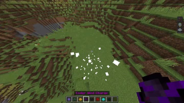 Flying using wind charges in Minecraft PE (Bedrock)